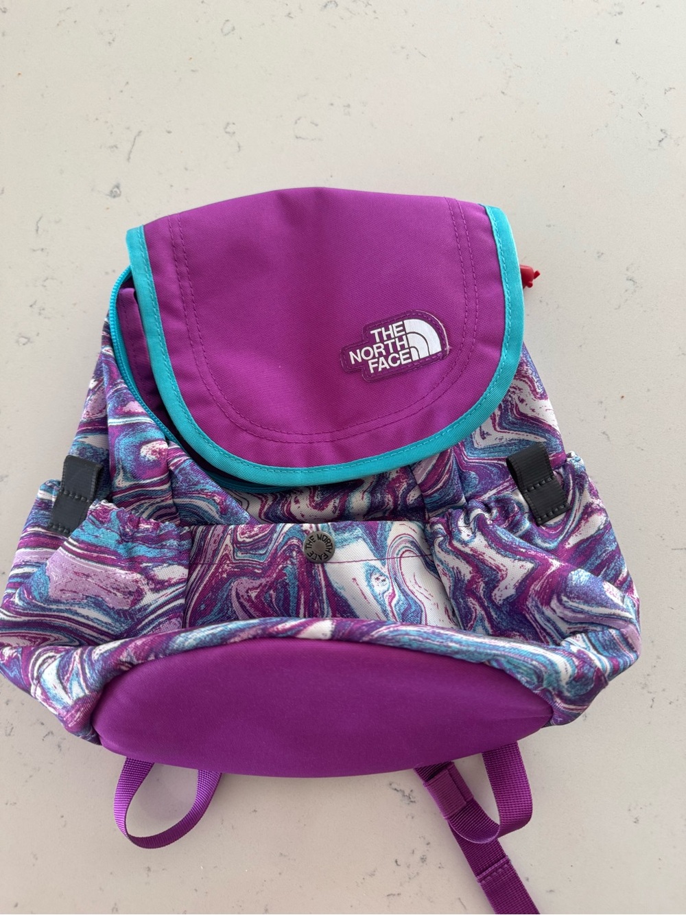 The North Face Kids Purple Backpack with Turquoise Trim